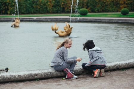 Saint Petersburg, Russia - 18 September 2015 - fountaine in the upper garden in Peterhof park, kids playingのeditorial素材