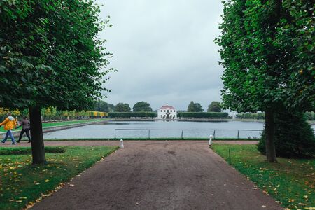 Saint Petersburg, Russia - 18 September 2015 - Fountaine in the upper garden in Peterhof park in rainy day.のeditorial素材