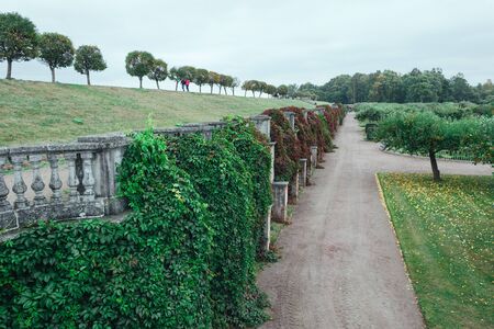Saint Petersburg, Russia - 18 September 2015 - Colorful autumn fencing in Peterhof, Saint Petersburg, Russiaのeditorial素材