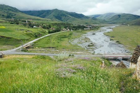 Bright green summer mountains landscape in Dargavs, North Ossetia - Alania, Caucasus, Russia. Green...