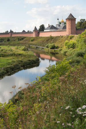 Suzdal, The Golden Ring of Russia, view on Spaso-Efimyevsky monastery and river Kamenka in summerの写真素材