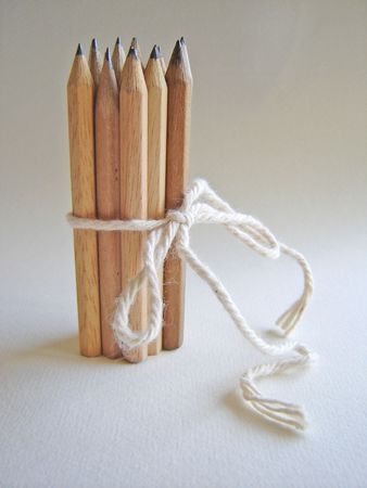       	 Photograph depicting a group of wooden pencils connected with each other                          の写真素材