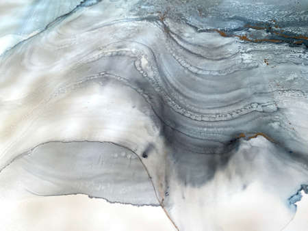 Abstract blue background with gray and gold. Fluid backdrop. Beautiful smudges and stains made with...