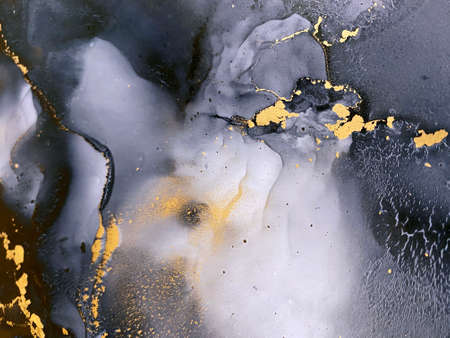 Abstract gray background with gold. Black and white texture. Beautiful smidges and stains made with alcohol ink. Fragment of art with smoke effect resembles stone, marble, watercolor, aquarelle.の写真素材