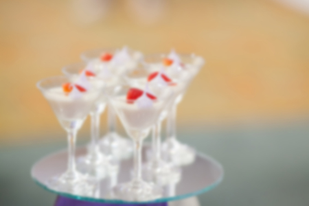 Stylish sweet candy buffe set at the wedding ceremony confectionery out of focus , blur background.の写真素材