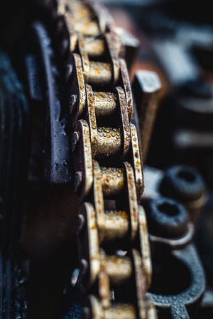 Wet chain from an engine with water dropsの写真素材