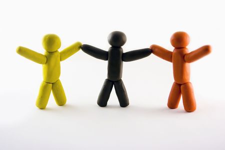 Three plasticine men standing isolated on white backgroundの写真素材