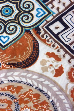 Ornate fabric with versatile image as background