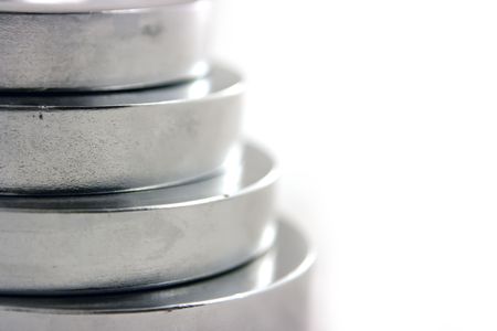 Weights made of stainless steel isolated on white backgroundの写真素材