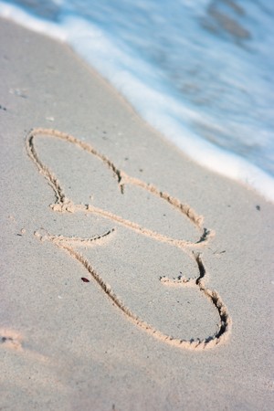 Two hearts on the sandy beach