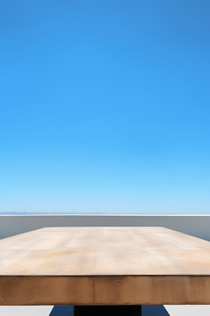 Empty wooden table top with blue sky background. For product display.の素材