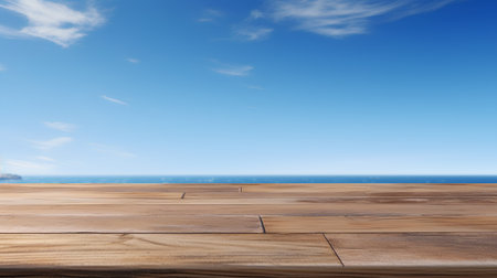 Wooden floor with sea and blue sky background for product display.の素材