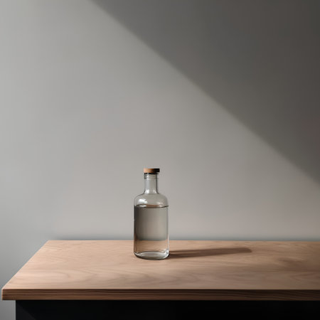 Empty glass bottle on wooden table. Mock up, 3D Renderingの素材