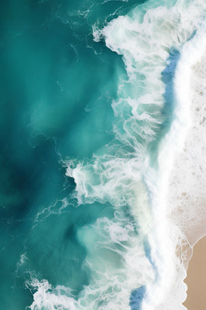 Aerial view of ocean waves breaking on sandy beach. Nature backgroundの素材