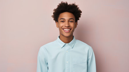 Young african american man with afro hairstyle smiling at cameraの素材