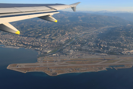 View the Cote d'Azur, Var river, Alps mountains and Nice airport with flight altitude of the aircraft.の写真素材