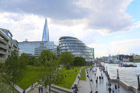 London, Great Britain -May 23, 2016: City Hall, corporate modern offices building on the South Bank of the River Thamesのeditorial素材