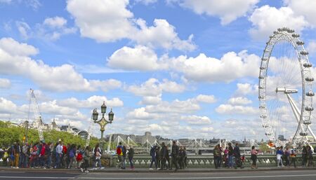 London, Great Britain -May 22, 2016: Pedestrians and tourists on the Westminster Bridgeのeditorial素材