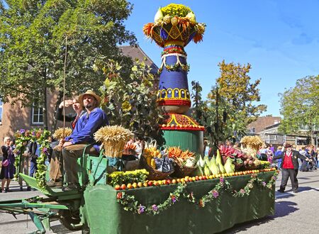 Stuttgart, Germany-September 30, 2018: beer festival, festive procession with a new crop and agricultural productsのeditorial素材