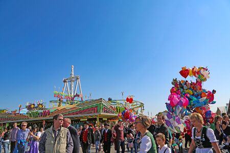 Stuttgart, Germany-September 30, 2018: beer festival, festive fairground and ridesのeditorial素材