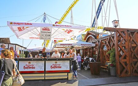 Stuttgart, Germany-September 30, 2018: beer festival, festive fairground and ridesのeditorial素材