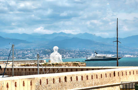 Antibes, France - June 16, 2014: Nomade by Jaume Plensa, Bastion Saint Jaumeのeditorial素材