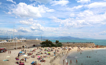 Antibes, France - June 16, 2014: Beautiful sea beach in Antibes on a sunny summer dayのeditorial素材