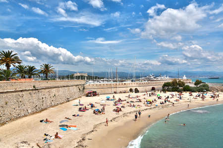 Antibes, France - June 16, 2014: Beautiful sea beach in Antibes on a sunny summer dayのeditorial素材