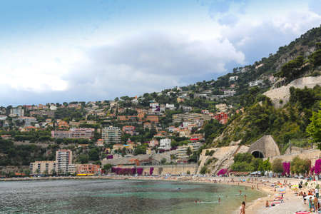 Villefranche-sur-Mer, France - June 16, 2014: Beautiful sea beach on a sunny summer dayのeditorial素材