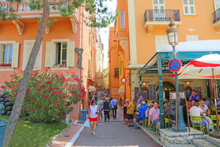 Monaco City, Monaco - June 13, 2014: picturesque narrow street and cafÃ© in the old townのeditorial素材