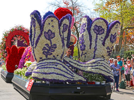 Sassenheim, Netherlands - April 21, 2018: 100 years Bloemencorso Bollenstreek Flower Parade traditional folk holidayのeditorial素材