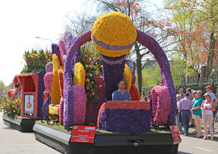 Sassenheim, Netherlands - April 21, 2018: 100 years Bloemencorso Bollenstreek Flower Parade traditional folk holidayのeditorial素材