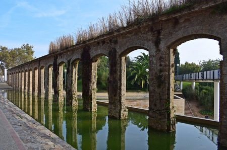 Aqueduct in urban park El Clot of Barcelona.の写真素材