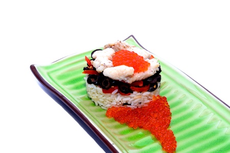 Fashion seafood with rice olives and red caviar isolated on whiteの写真素材