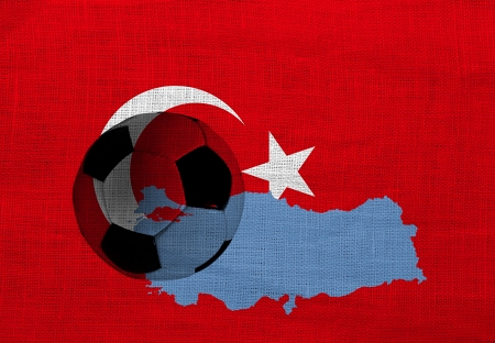 Football ball on the national flag of Turkeyの写真素材