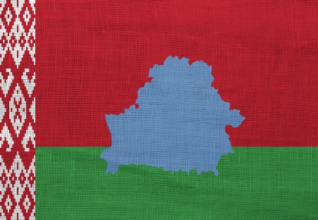 Flag and map of Belarus on a sackclothの写真素材