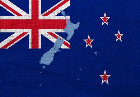 Flag and map of New Zealand on a sackclothの写真素材