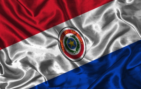 Waving colorful Paraguay flag on a silk backgroundの写真素材