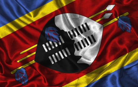 Waving colorful Swaziland flag on a silk backgroundの写真素材