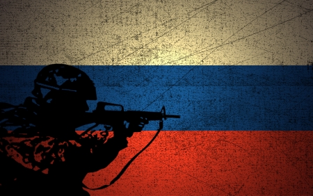 A silhouette of a soldier on the Grunge Russian Flagの写真素材