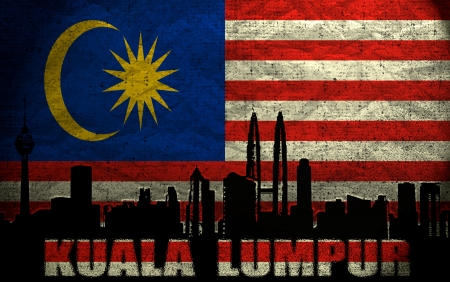 View of Kuala Lumpur on the Grunge Malaysian Flagの写真素材