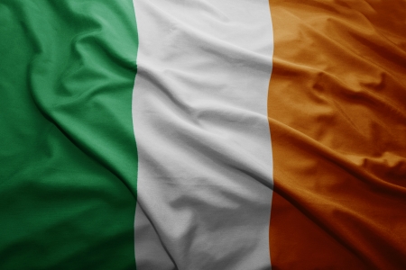 Waving colorful Irish flagの写真素材