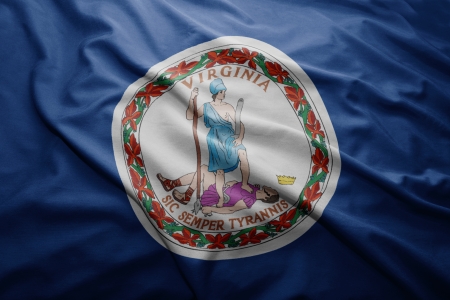 Waving colorful Virginia flagの写真素材