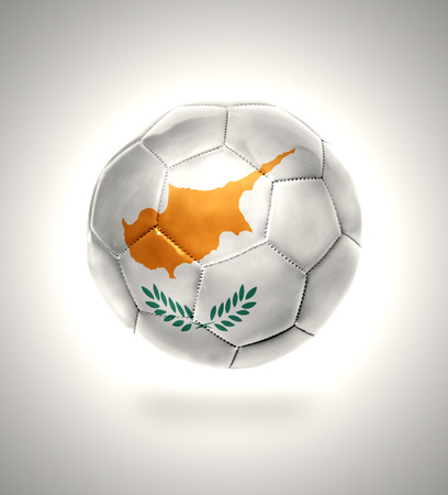 Football ball with the national flag of Cyprus on a gray backgroundの写真素材