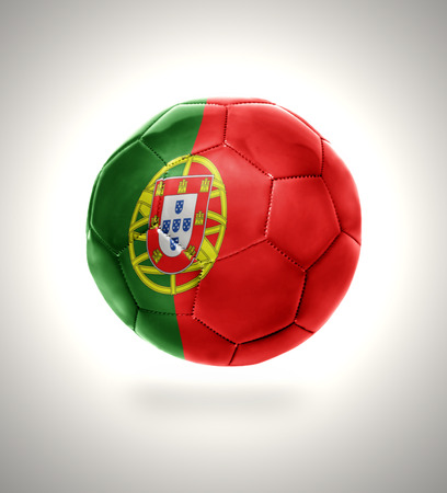 Football ball with the national flag of Portugal on a gray backgroundの写真素材