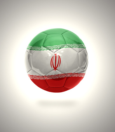 Football ball with the national flag of  Iran on a gray backgroundの写真素材