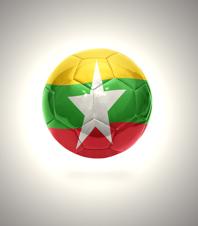 Football ball with the national flag of Myanmar on a gray backgroundの写真素材