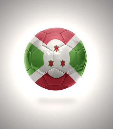 Football ball with the national flag of Burundi on a gray backgroundの写真素材