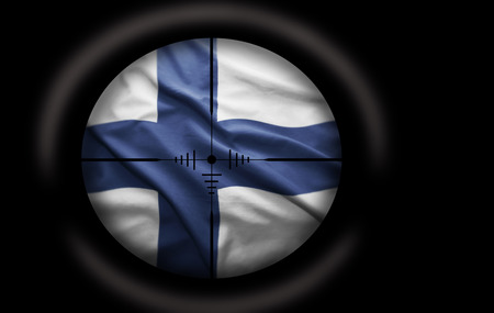 Sniper scope aimed at the Finnish flagの写真素材