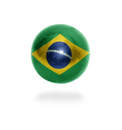 Flag of Brazil on the ball isolated on whiteの写真素材